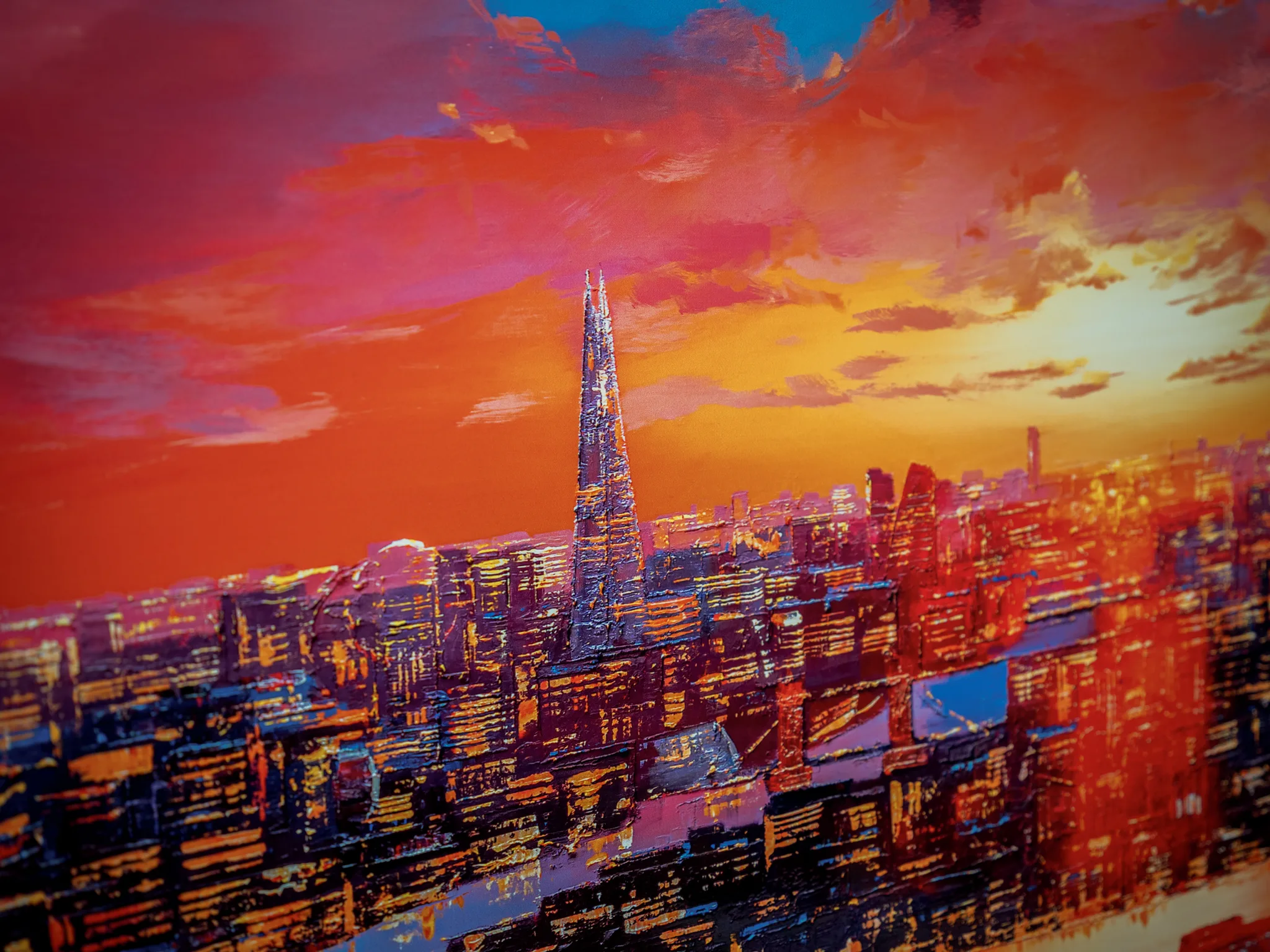 Detail of London Embers, a limited edition print by Paul Kenton: the Shard rises above a textured city skyline under a fiery orange and red sunset sky.
