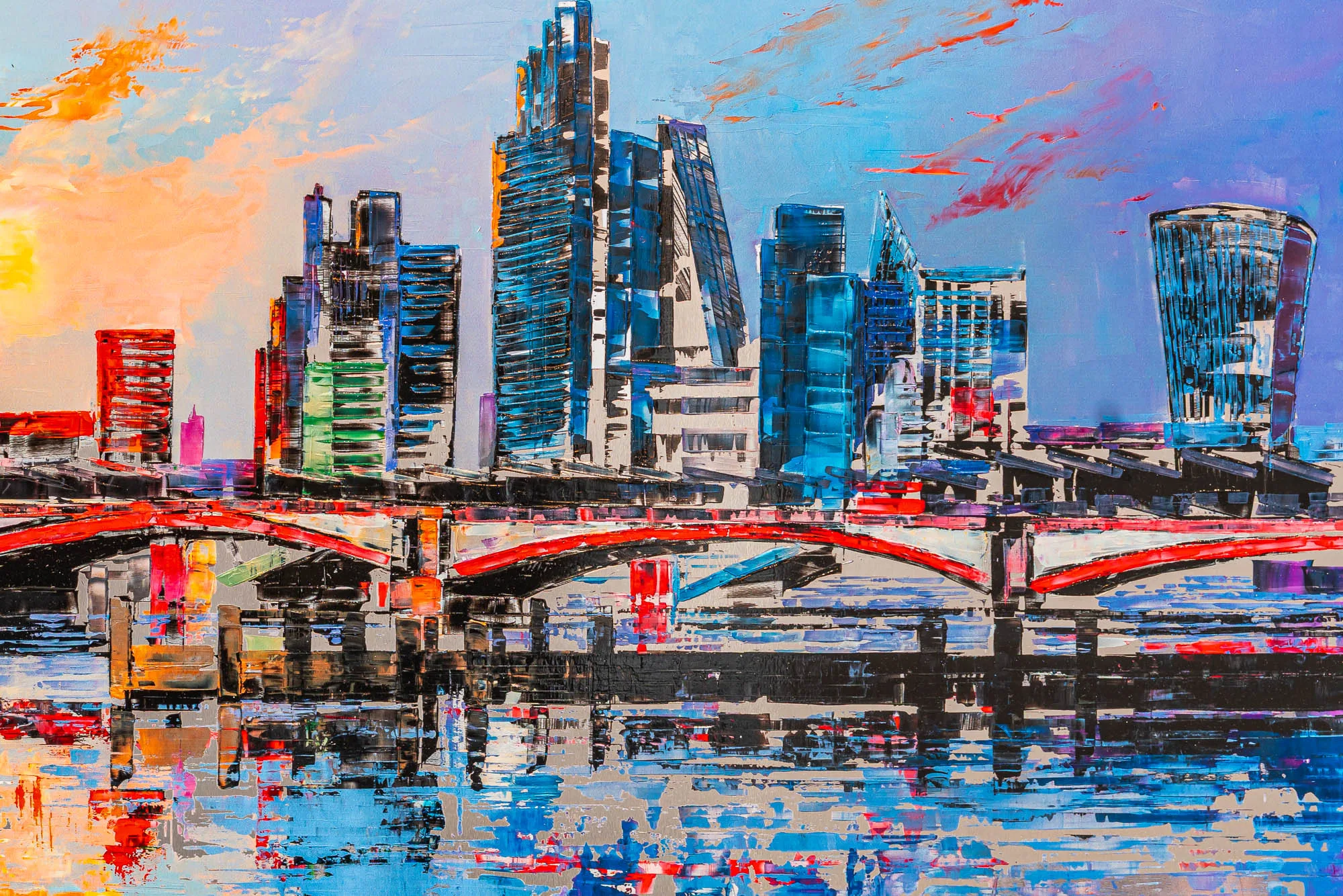 Close-up of London Reflects, a limited edition print by Paul Kenton: thick textured brushstrokes show a City of London skyline with a red arched bridge, its glowing towers mirrored in dark water below.