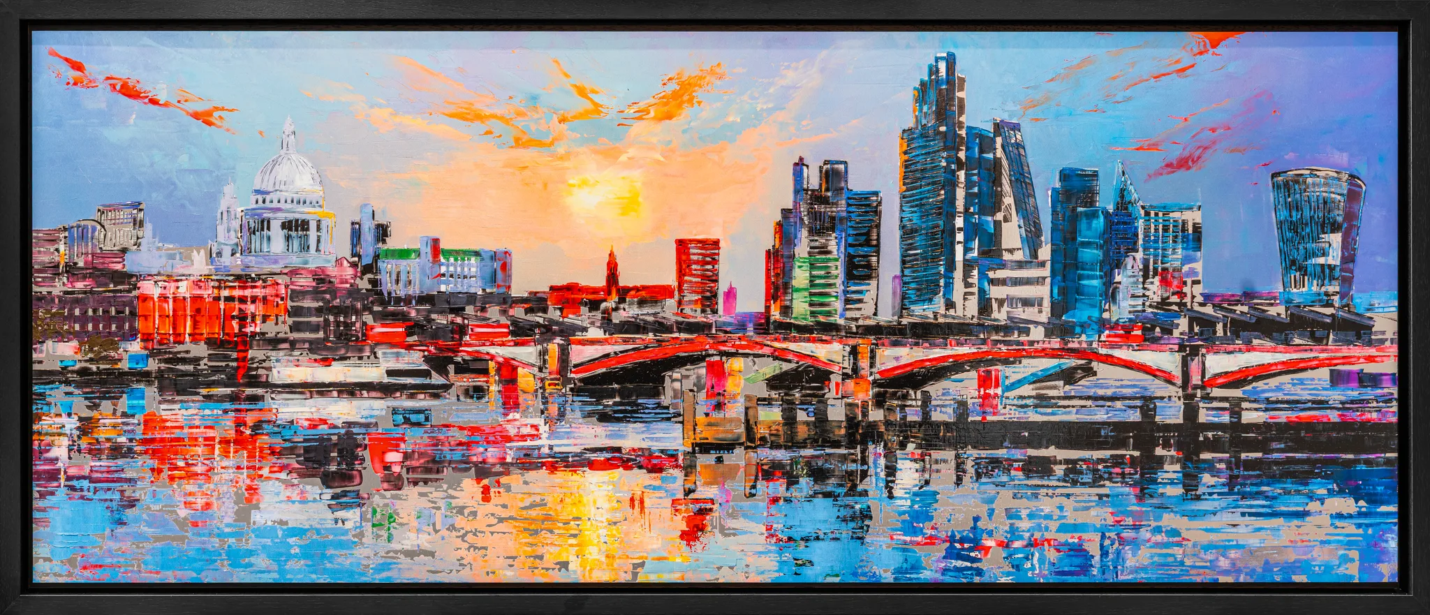 London Reflects, a limited edition print by Paul Kenton in a slim black frame: a bold, textured view of the Thames at sunset, with St Paul's dome, a red bridge and glass towers reflected in rippling blue and orange water.