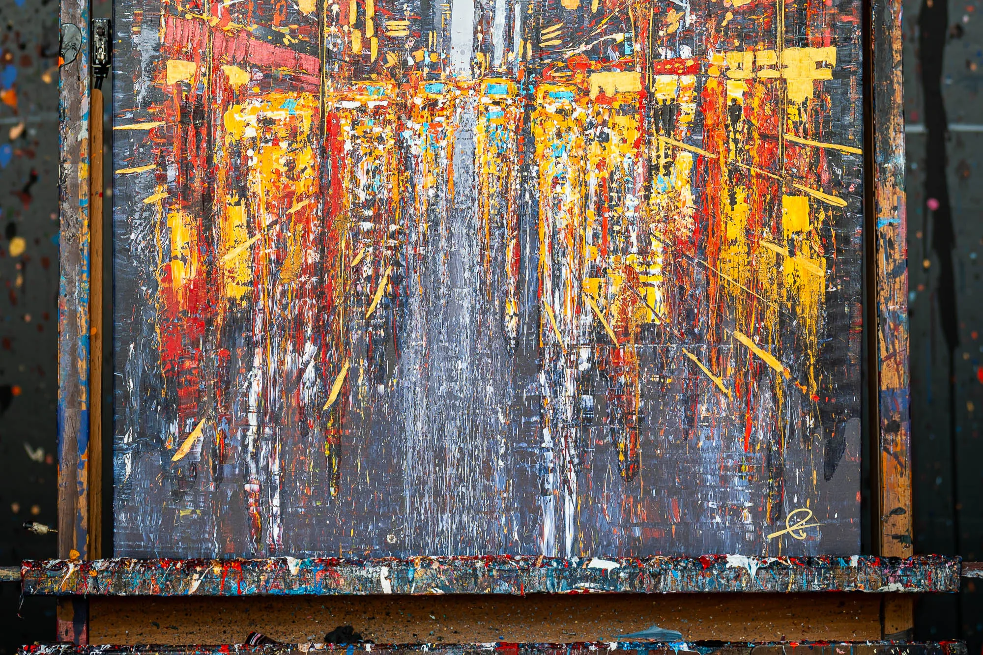 Close-up of New York Serenade, a limited edition embellished giclée print on canvas: textured drips of red, gold and white rise over a dark grey urban skyline, with paint-splattered edges.