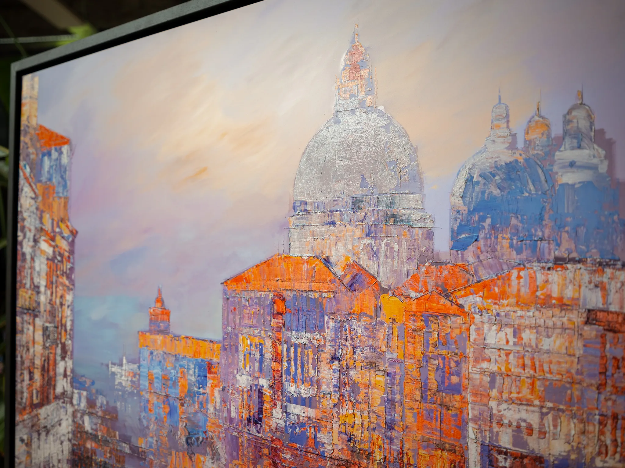 Close-up of Opalescent Venice, an embellished giclée print by Paul Kenton, showing a silvery domed church above orange and lilac Venetian façades under a pale pink sky.