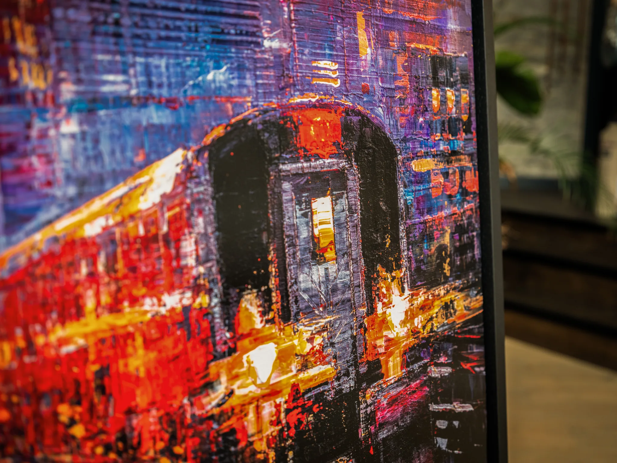 Close-up of Urban Approach, a limited edition print by Paul Kenton, showing thick textured brushwork of a dark arched doorway glowing with red, orange and gold light against purple and blue city walls.
