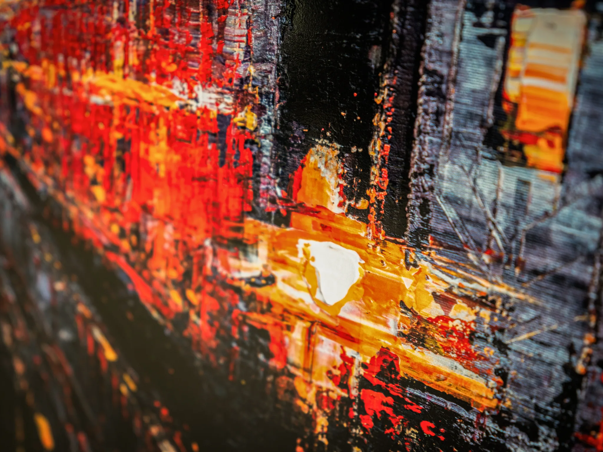Close-up of Urban Approach, a limited edition print by Paul Kenton, showing thick red, orange and white paint ridges over dark, textured blacks and greys, with a glowing yellow patch at centre.