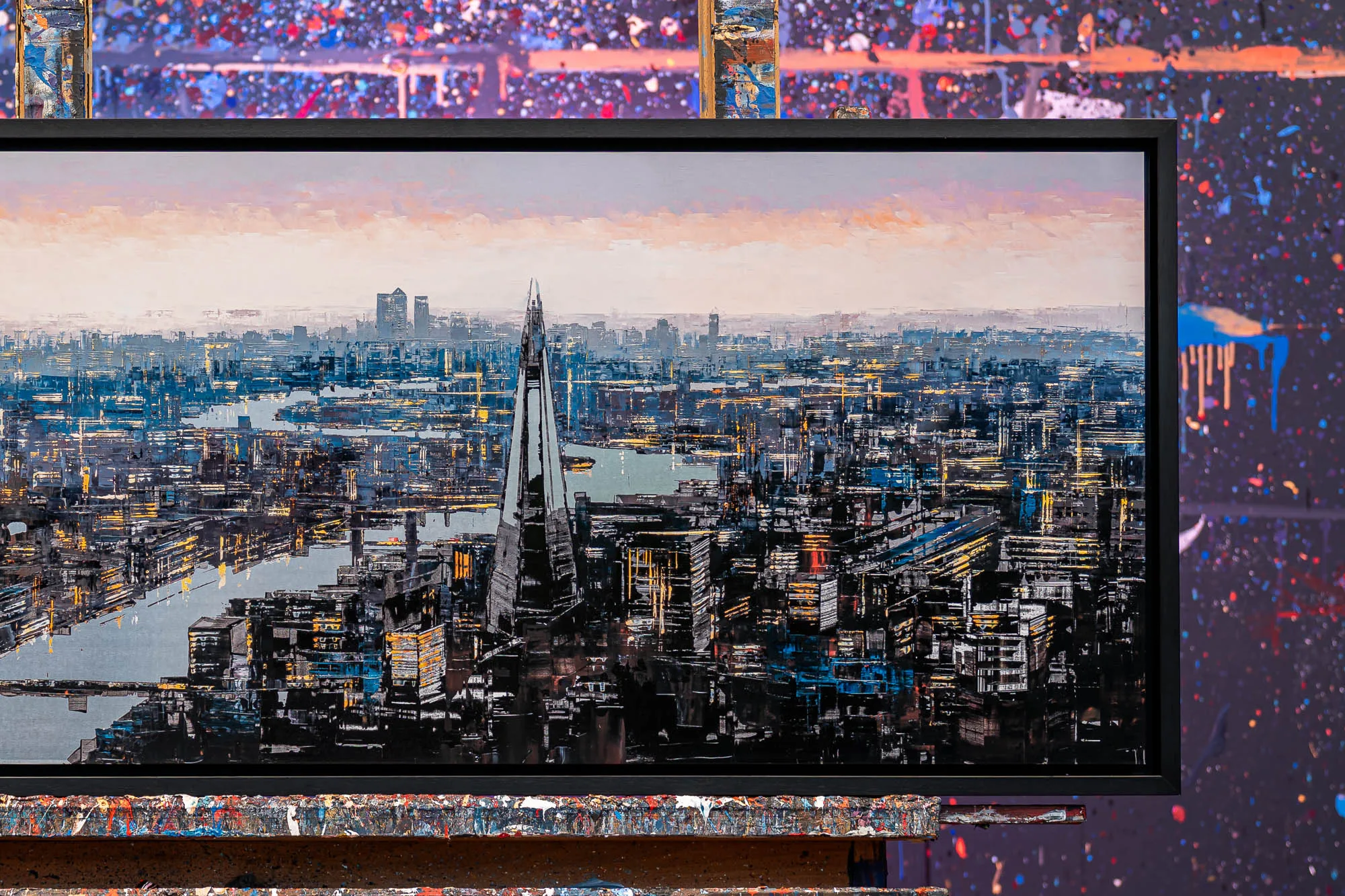 Vista Reflections, a limited edition print of London at dusk, with the Shard rising above the textured river and gold city lights.
