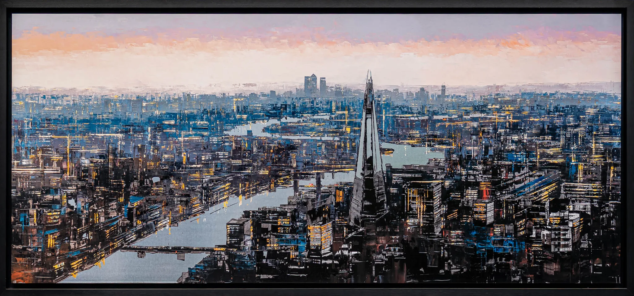 Vista Reflections, a wide panoramic view over London at dusk: the Shard rises at centre right above a river winding through dense, glowing cityscape under a pale pink sky. Framed in a slim black border.