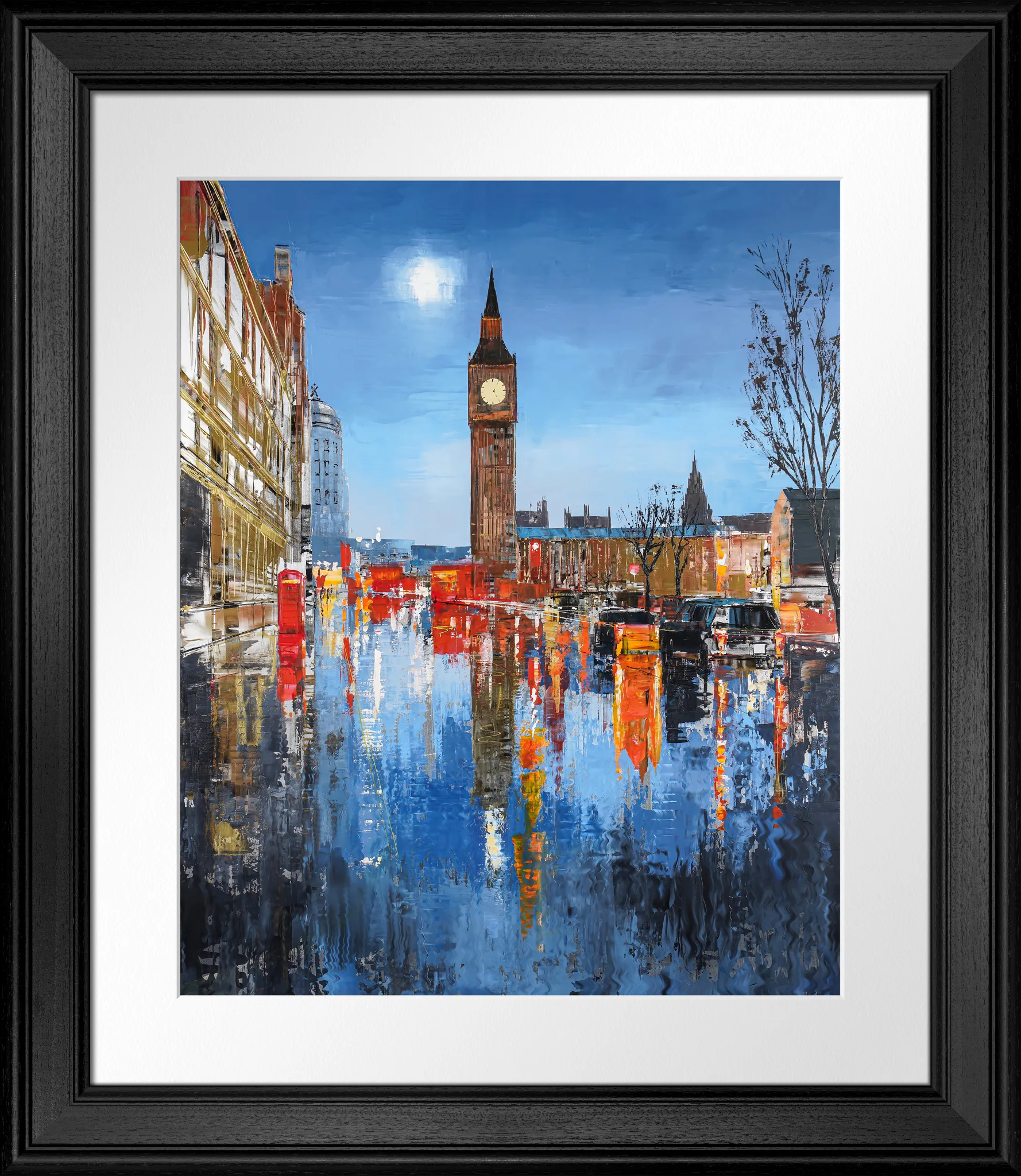 Westminster Illuminates, a limited edition print by Paul Kenton in a black frame with white mount: a wet London street at dusk reflects red buses, lamps and Big Ben in blue and orange.