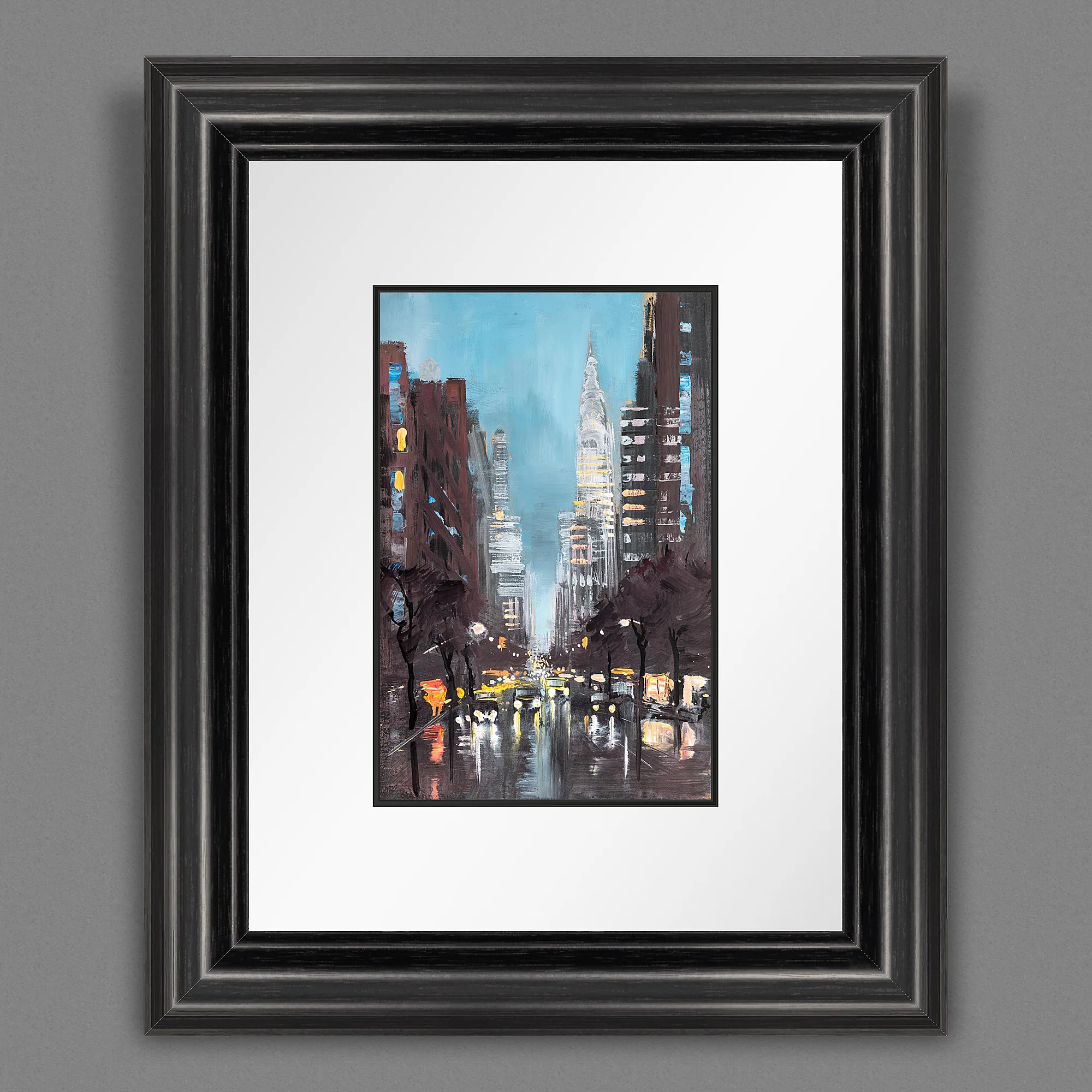 Chrysler Shines, a limited edition print by Paul Kenton in a black frame with white mount: a rainy New York street at dusk, lit by yellow taxi lights, with the Chrysler Building glowing at the end.