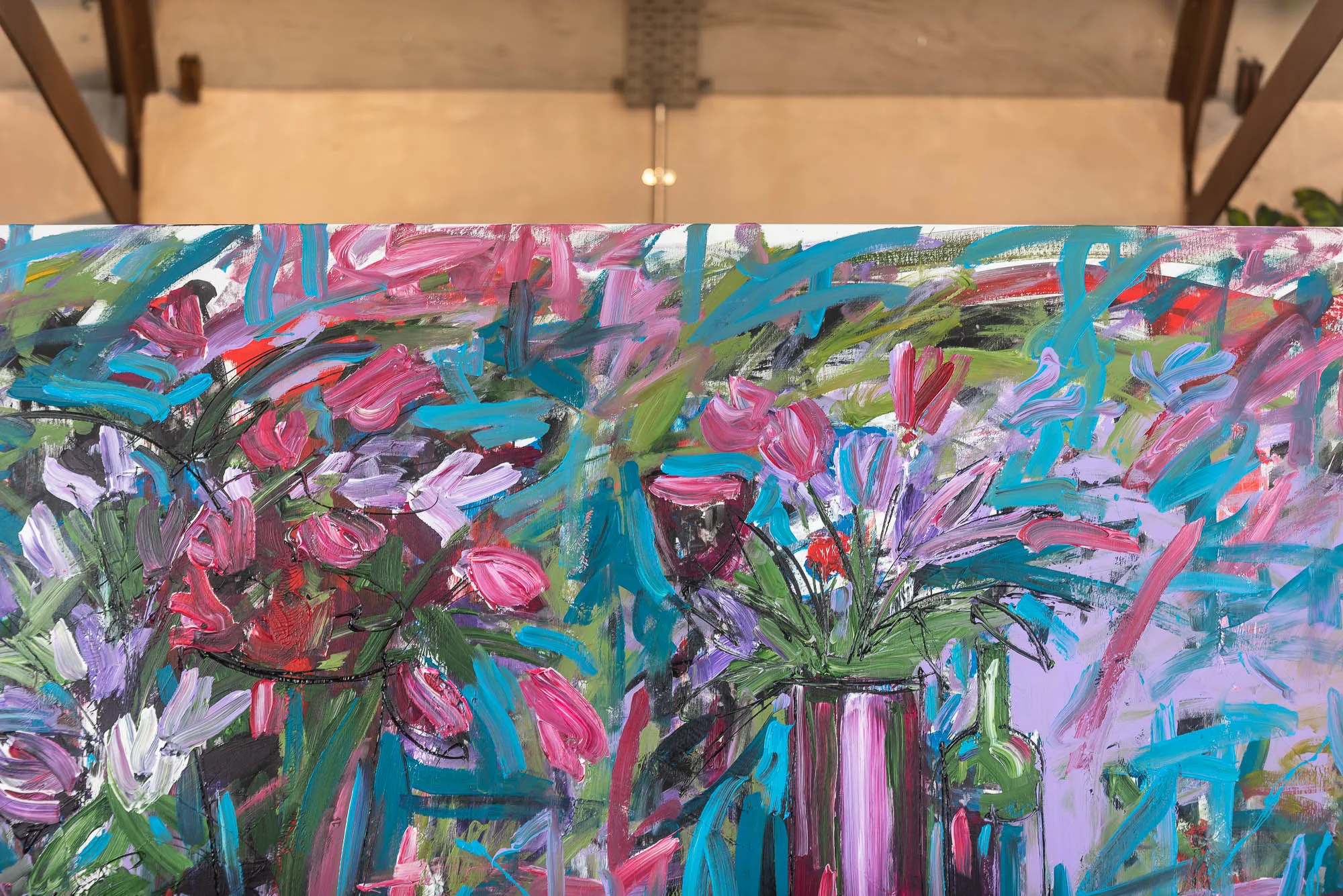 Close-up of Joy, an original mixed media painting by Paul Kenton: loose, energetic brushstrokes of pink tulips, violet blooms and turquoise foliage in a vase.
