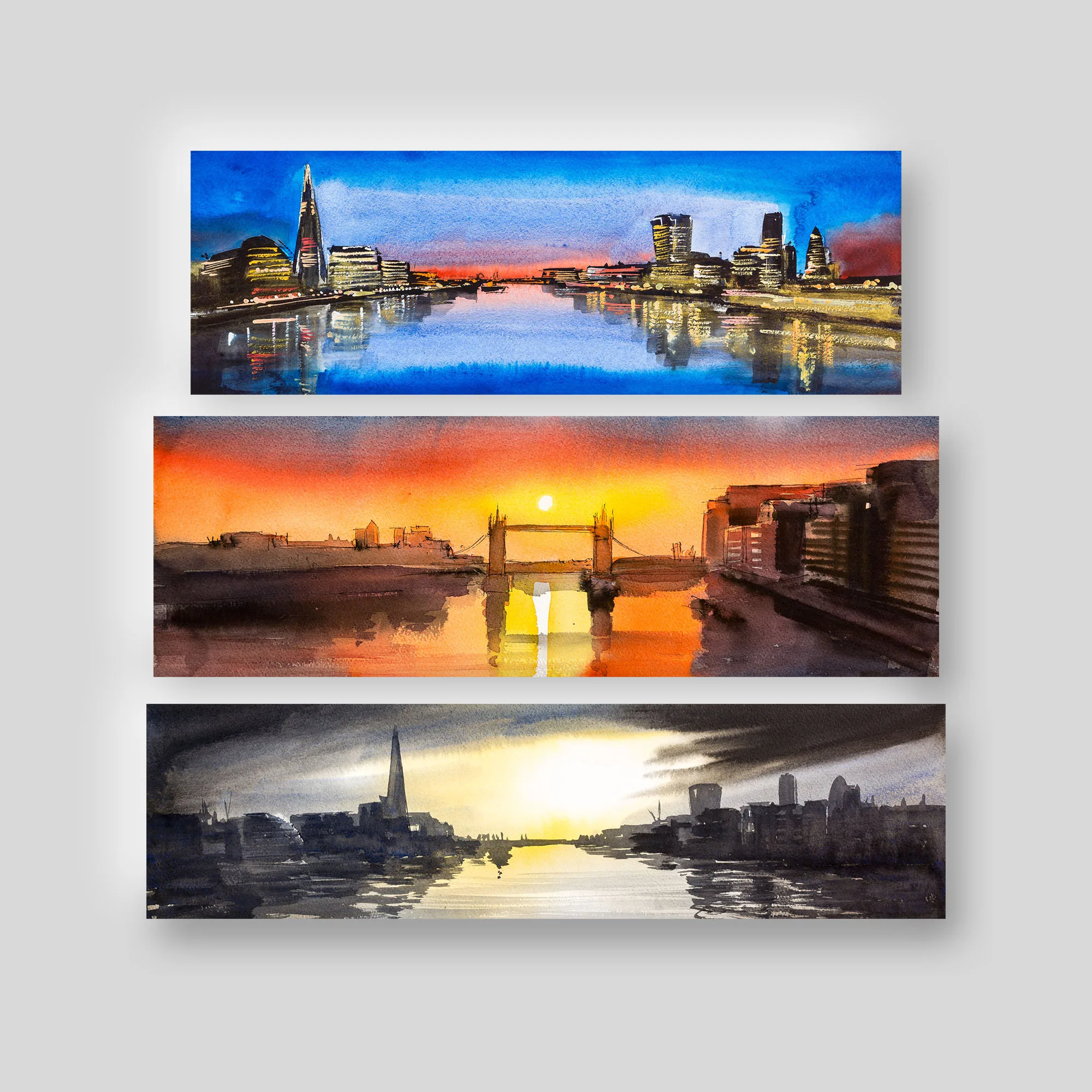 London Panoramas, a print collection set by Paul Kenton: three stacked panoramic Thames views, from a blue dusk skyline with the Shard, to an orange sunset behind Tower Bridge, to a grey skyline under a golden sun.