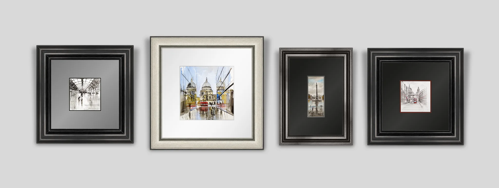 London Pen & Ink print collection set: four framed prints hang on a grey wall, each with a different frame and mat, showing London scenes in pen and ink with light watercolour washes.