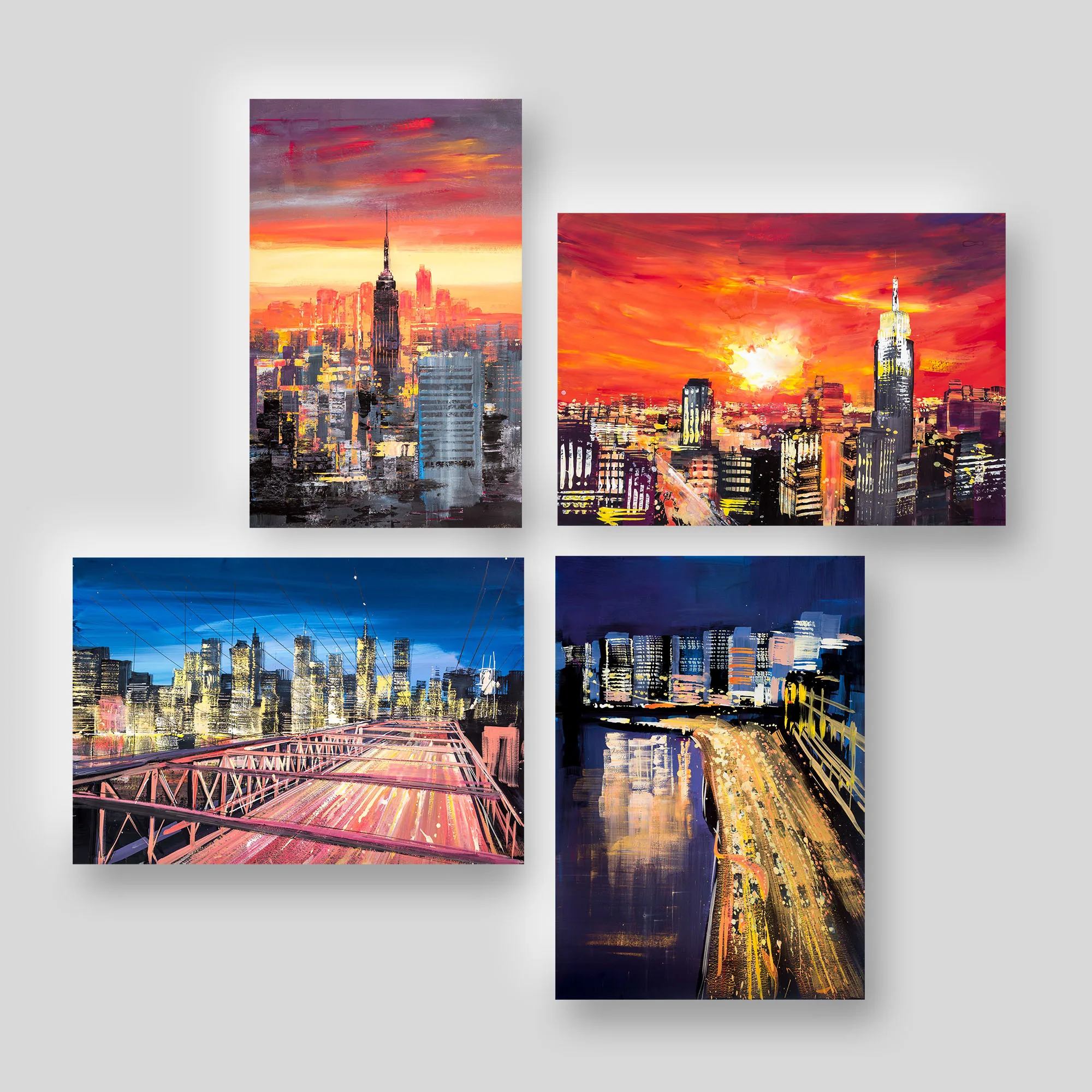 New York Night Skyline, a print collection set by Paul Kenton: four giclée prints of Manhattan, from a fiery sunset over the Empire State Building to a blue-lit bridge and a traffic-streaked river at night.