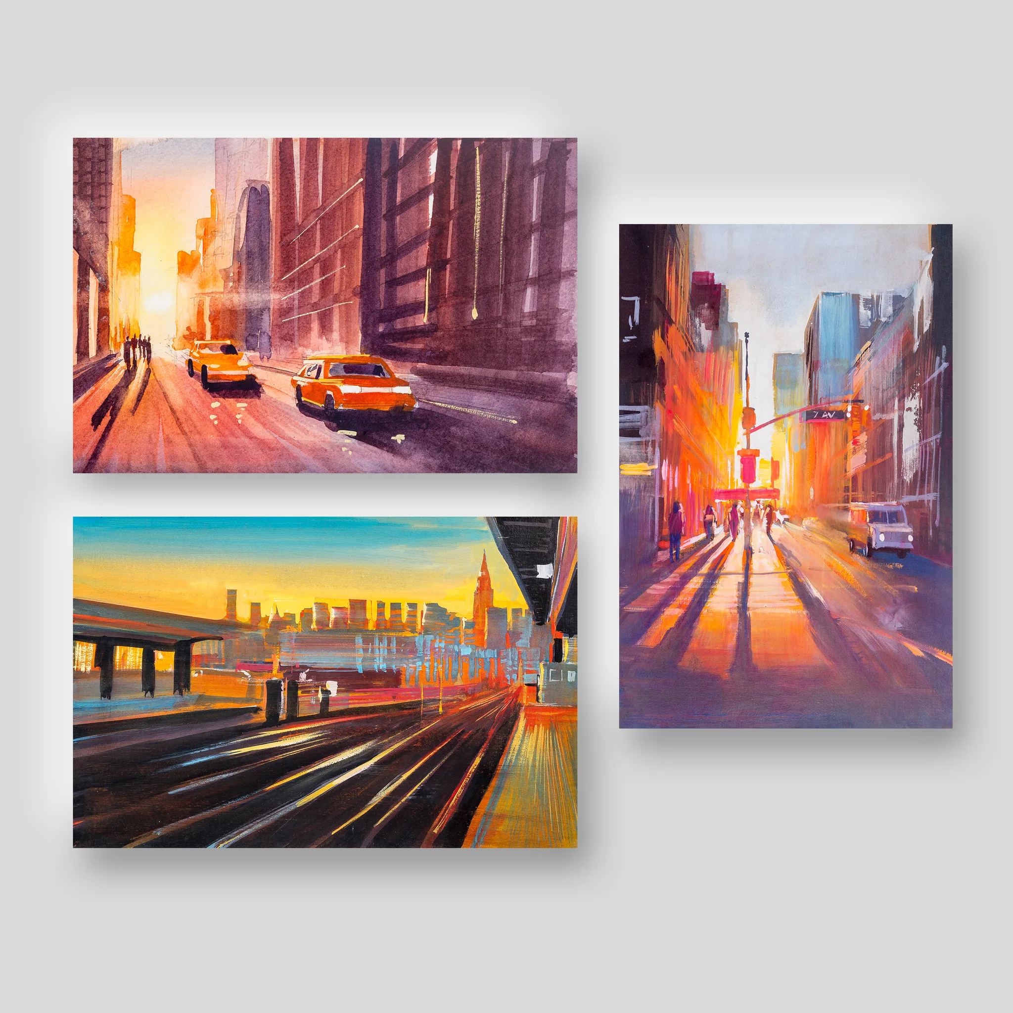 New York Sunsets, a print collection set by Paul Kenton: three city street scenes in warm orange and violet sunset light, with yellow taxis, pedestrians and a sunlit avenue.