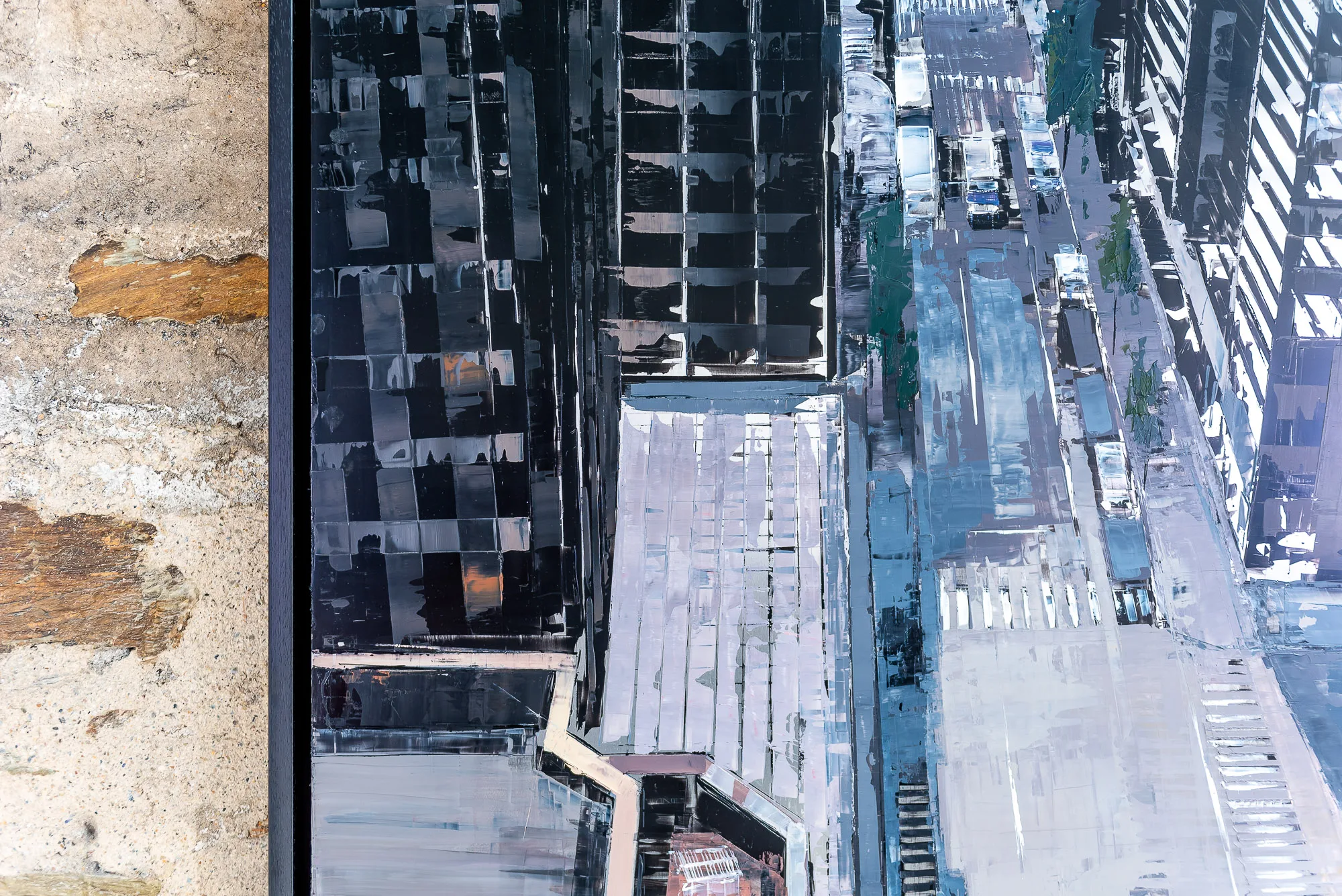 Close-up of Towering Perspective, an original painting by Paul Kenton: textured grey and black skyscraper facades and a pale street below, with traffic and crosswalks seen from above.