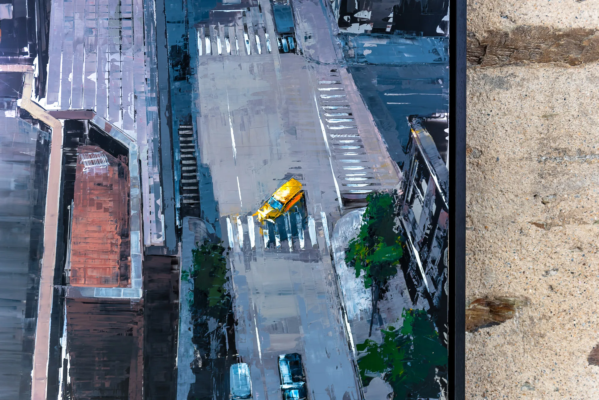 Close-up of Towering Perspective, an original painting by Paul Kenton: a bird's-eye view of a New York street with a yellow taxi, zebra crossings and green trees, in bold, textured grey and blue brushwork.