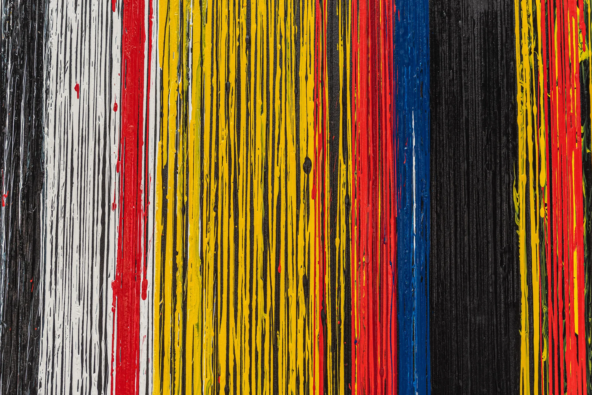 Close-up of Uniform Oscillation, an original acrylic painting by Paul Kenton: vertical drips and streaks of red, yellow, black, white and blue run side by side, with thick, textured paint.