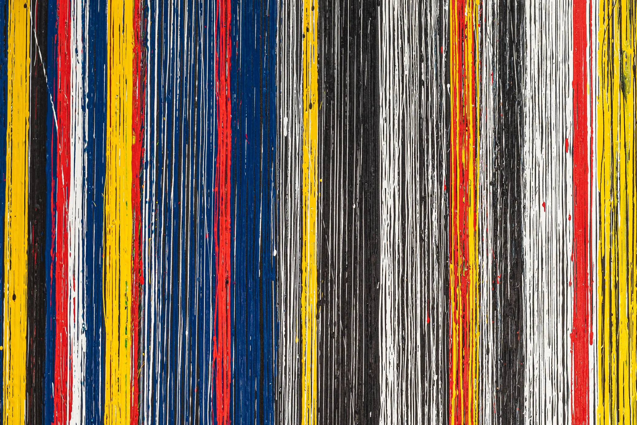 Close-up detail of Uniform Oscillation, an original acrylic painting by Paul Kenton, showing bands of yellow, red, blue, white and black paint dripping in fine vertical lines.