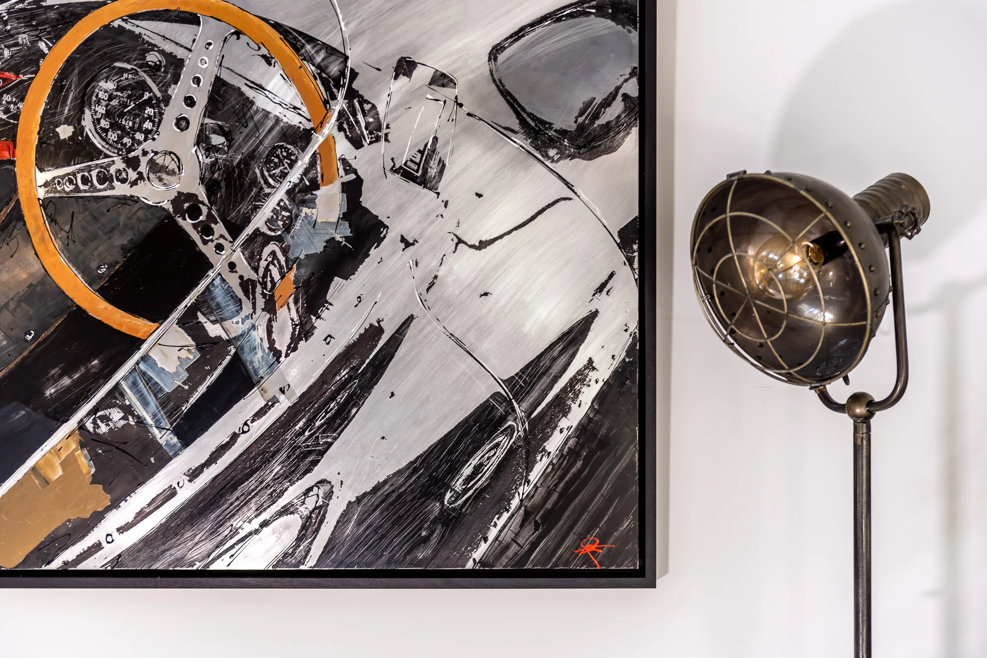 Start with the Checklist, an original mixed media painting on aluminium by Paul Kenton: a bold black, white and silver view of a classic car's interior, with an orange-rimmed steering wheel and dashboard dials, in loose, slashing brushstrokes.